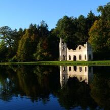 A-peaceful-view-across-the-water-of-Painshills-ruined-abbeyresize