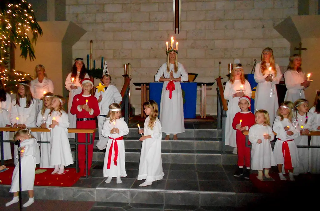 The Lucia pageant of the Swedish Club of Sarasota, St Armands Key Lutheran Church by Roger W on 9 December 2011. Creative Commons. 